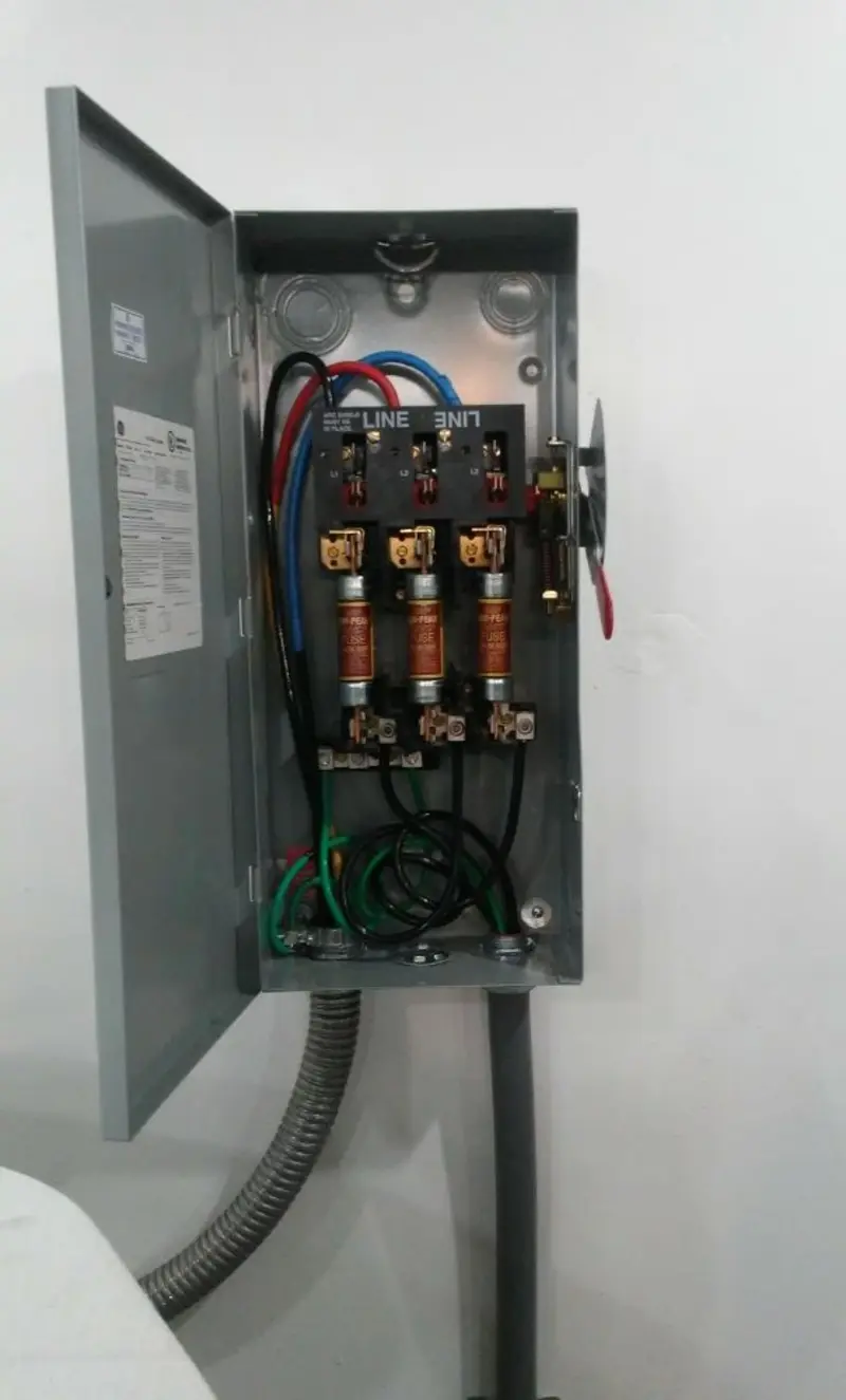 Three-phase disconnect switch installed for Smoke Detector Installation in Brecknock